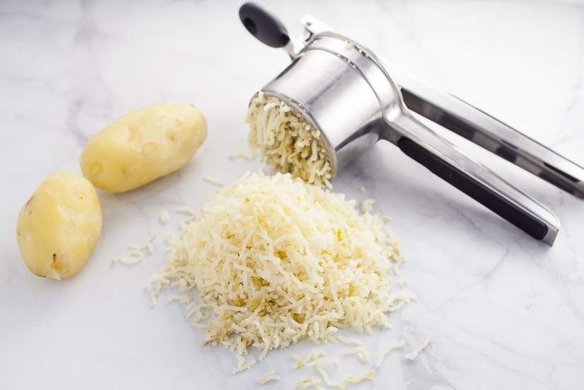 Put the potatoes through the potato ricer. Homemade Potato Gnocchi Recipe - If you've ever wondered if you can make your own Homemade Potato Gnocchi, you can! With this easy, detailed recipe and tutorial, you'll be making your new favorite gnocchi like a pro in no time! Make your own homemade potato gnocchi to put in your favorite pasta recipe. 