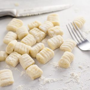 Homemade Potato Gnocchi Recipe - If you've ever wondered if you can make your own Homemade Potato Gnocchi, you can! With this easy, detailed recipe and tutorial, you'll be making your new favorite gnocchi like a pro in no time! Make your own homemade potato gnocchi to put in your favorite pasta recipe. 