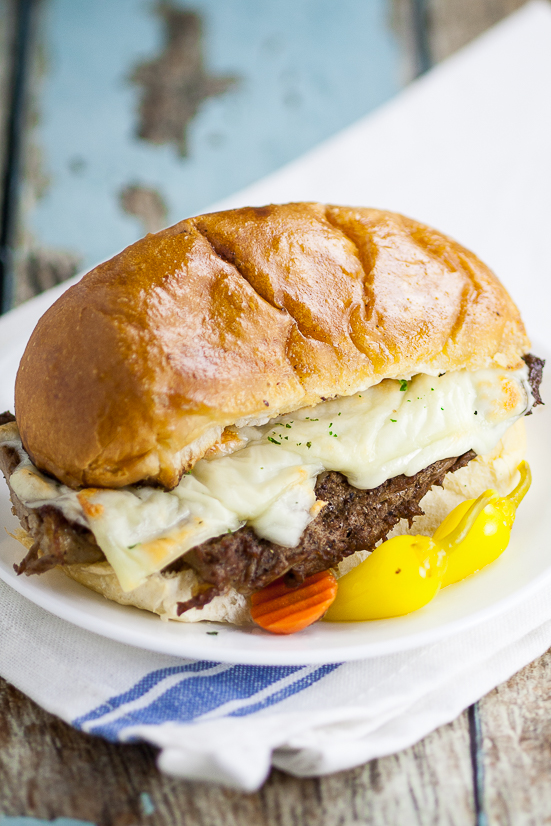 Steak Po' Boys recipe - Juicy steak and creamy cheese on a warm garlic buttery roll make these Steak Po' Boys a heavenly experience and they're so easy to make too! Perfect for a quick and easy family dinner recipe. 6 ingredients and just 20 minutes!