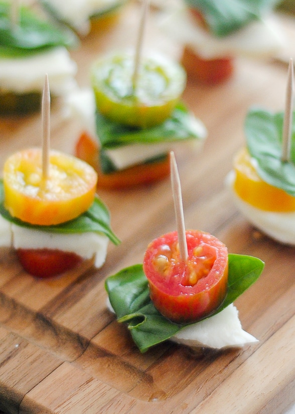 Caprese Bites Recipe - A fresh and simple appetizer or snack, these Caprese Bites are easy to make and delicious to eat! Great way to use up fresh Summer produce. Super easy appetizer recipe!