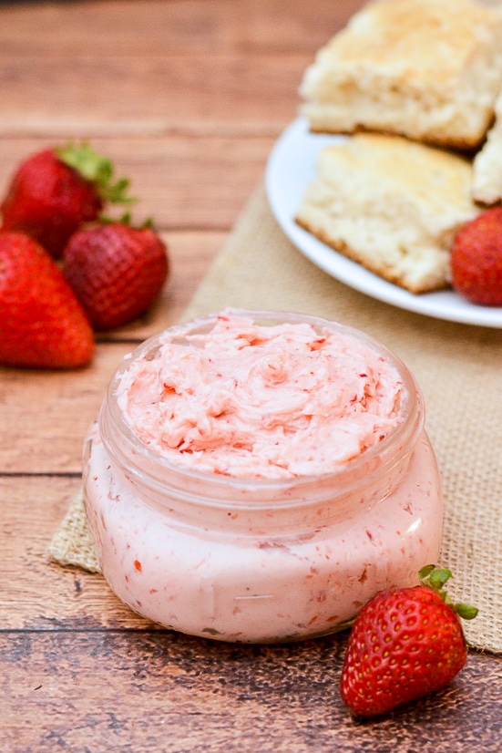 Whipped Strawberry Butter recipe - Sweet and fresh Whipped Strawberry Butter goes perfectly on your favorite roll, biscuit, or scone for a refreshing and yummy treat. Make it in just 10 minutes with 3 ingredients! Yummy and easy DIY gift idea too! Just put it in a mason jar and tie a bow with twine.  