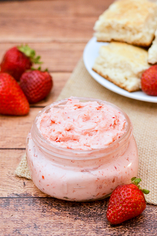 Whipped Strawberry Butter recipe - Sweet and fresh Whipped Strawberry Butter goes perfectly on your favorite roll, biscuit, or scone for a refreshing and yummy treat. Make it in just 10 minutes with 3 ingredients! Yummy and easy DIY gift idea too! Just put it in a mason jar and tie a bow with twine.  