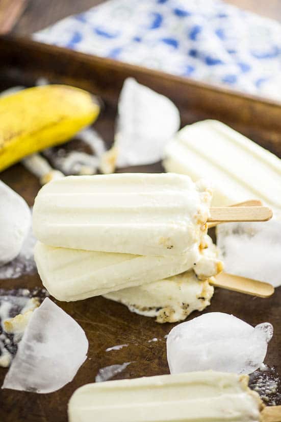 Banana Cream Pie Popsicles Recipe - Taking Banana Cream Pie to the next level, these Banana Cream Pie Popsicles will keep you cool and satisfied on a hot summer day. Just 4 ingredients to make this quick and easy popsicle recipe!