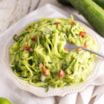 Creamy Avocado Zoodles Recipe - A fresh zucchini noodles recipe that takes less than 20 minutes to make, these Creamy Avocado Zoodles with creamy, fresh and a little zesty sauce are perfect for a simple Summer meal!