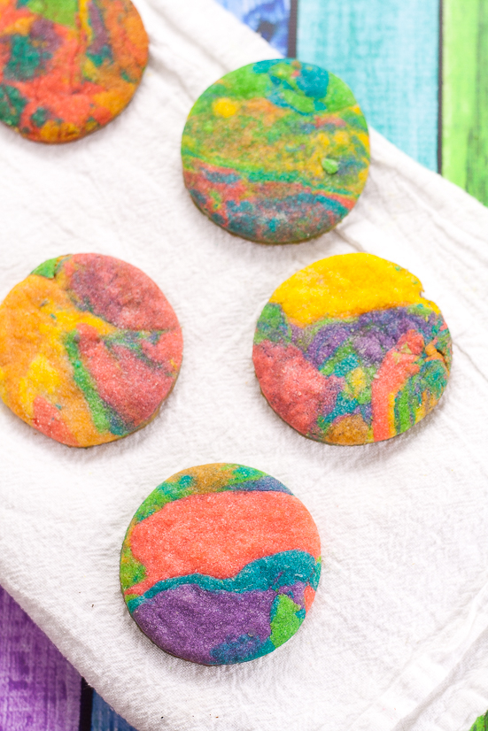 Tie Dye Cookies Recipe and Tutorial - Fun, easy, and bright, these adorable Tie Dye Cookies are a delicious and colorful treat that kids will love for a fun addition to any party!  Fun food for kids