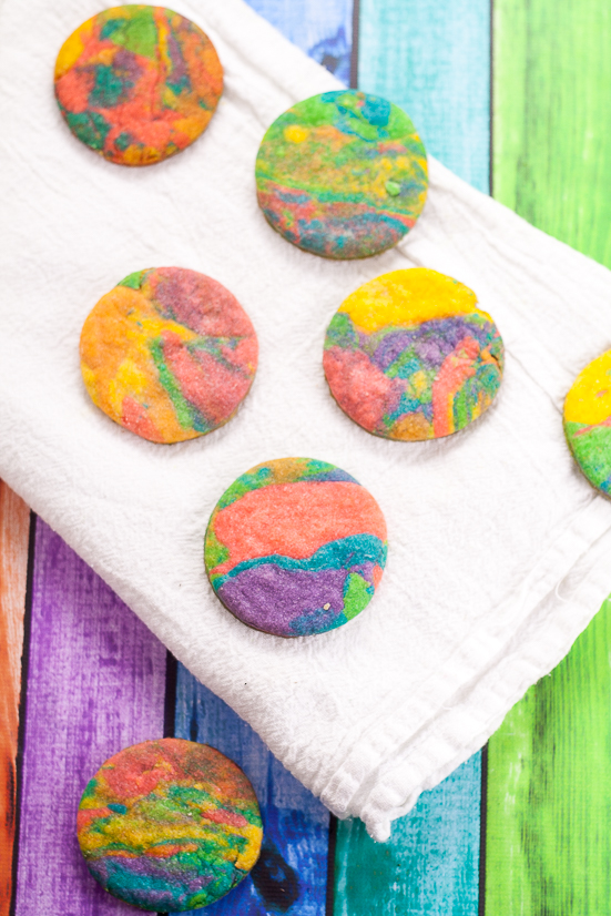 Tie Dye Cookies Recipe and Tutorial - Fun, easy, and bright, these adorable Tie Dye Cookies are a delicious and colorful treat that kids will love for a fun addition to any party!  Fun food for kids