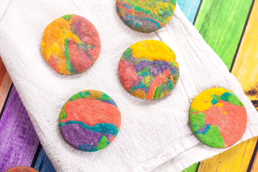 Tie Dye Cookies Recipe and Tutorial - Fun, easy, and bright, these adorable Tie Dye Cookies are a delicious and colorful treat that kids will love for a fun addition to any party!  Fun food for kids