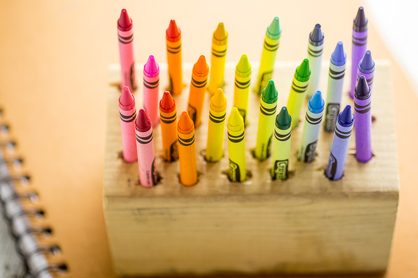 DIY Easy Crayon Organizer tutorial - Make this quick and easy Crayon Organizer for the kids to store their crayons or even colored pencils or markers. It's cheap, easy to make, easy to use, and a pretty way to organize the coloring mess! Perfect easy craft supplies organization for kids!