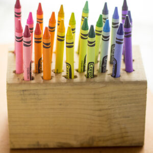 DIY Easy Crayon Organizer tutorial - Make this quick and easy Crayon Organizer for the kids to store their crayons or even colored pencils or markers. It's cheap, easy to make, easy to use, and a pretty way to organize the coloring mess! Perfect easy craft supplies organization for kids!