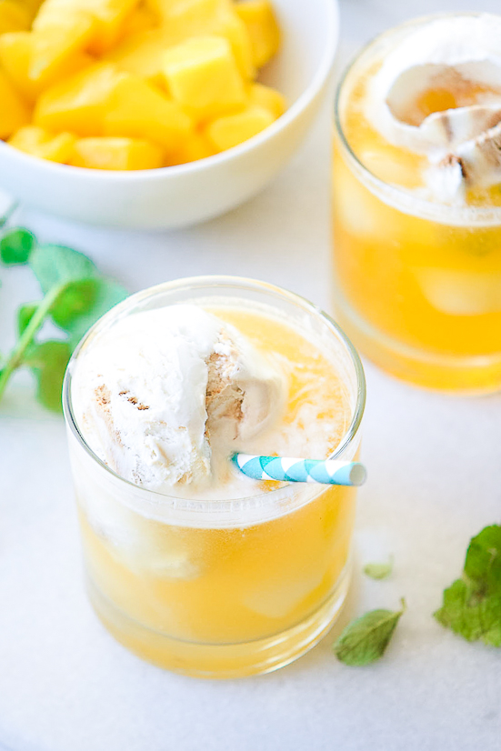 Peach Floats Recipe - Creamy, cool, and refreshing, these Peach Floats are the perfect tangy and sweet drink! Delicious for Summer and pretty for parties.   Makes a non-alcoholic drink for kids or a refreshing Summer cocktail.