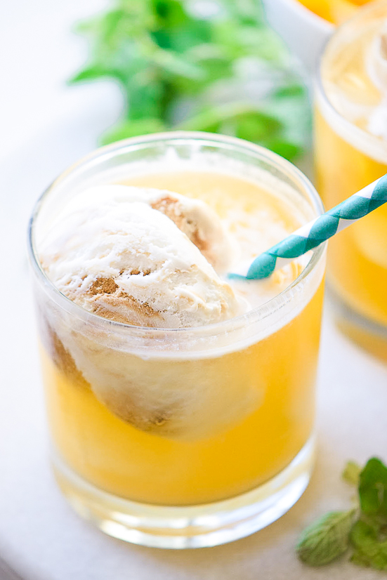 Peach Floats Recipe - Creamy, cool, and refreshing, these Peach Floats are the perfect tangy and sweet drink! Delicious for Summer and pretty for parties.   Makes a non-alcoholic drink for kids or a refreshing Summer cocktail.