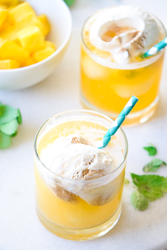 Peach Floats Recipe - Creamy, cool, and refreshing, these Peach Floats are the perfect tangy and sweet drink! Delicious for Summer and pretty for parties.   Makes a non-alcoholic drink for kids or a refreshing Summer cocktail.