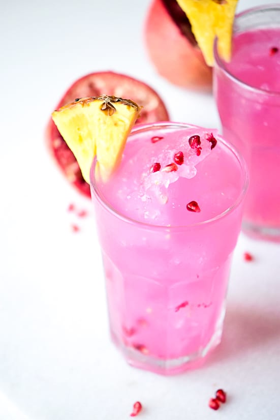 Pomegranante Pineapple Slushies Recipe - Cool, citrus flavors make this Pomegranate Pineapple Slushies recipe makes a perfect Summer refresher to cool off on a hot day. Easy Summer non-alcoholic drink recipe that kids can enjoy too!