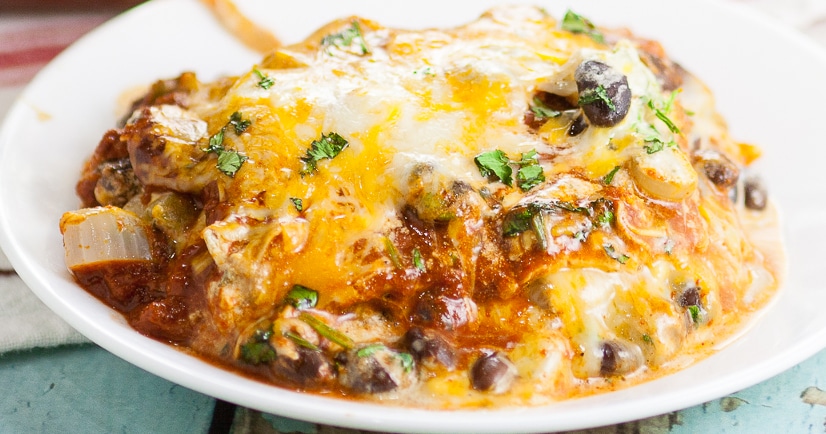 Black Bean Enchilada Casserole Recipe - Quick and easy Black Bean Enchilada Casserole is a perfect easy family dinner recipe with simple ingredients and all your favorite enchilada flavors in a baked casserole. 