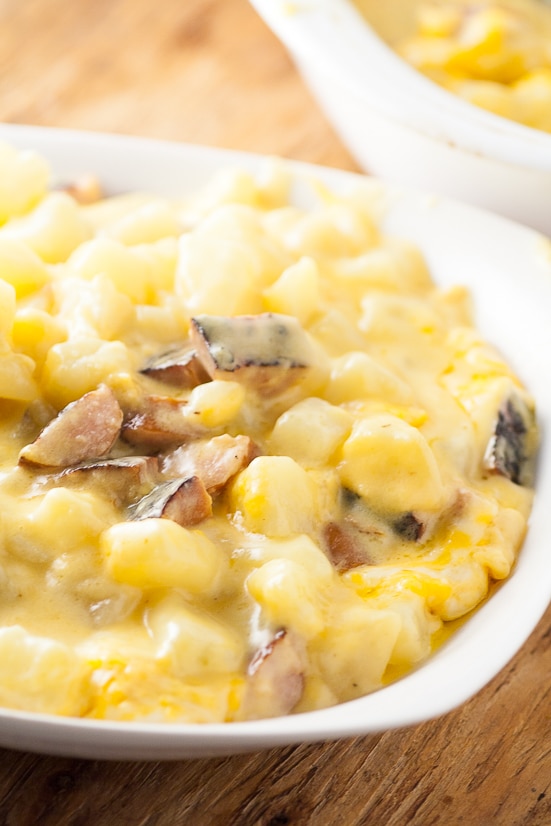 Cheesy Sausage and Potatoes Recipe - Cheesy Sausage and Potatoes are comfy, cozy, and easy to make.  Lots of potatoes, lots of cheese. Easy dinner recipe for a quick and easy weeknight meal. What makes it amazing is that it's classic and simple. An ultimate comfort food. 
