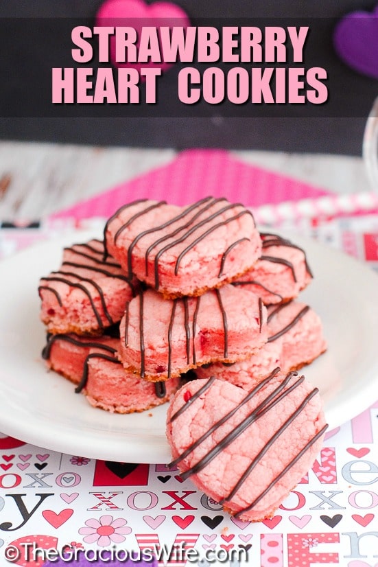 Strawberry Heart Cookies Recipe -  OMG! You will never believe how easy these cookies are to make. These 5 Ingredient Strawberry Heart Cookies come out perfect every time! Unbelievably delicious and EASY Strawberry Heart Cookies drizzled in chocolate and made with just 5 ingredients! They're easy to make because they start from cake mix!