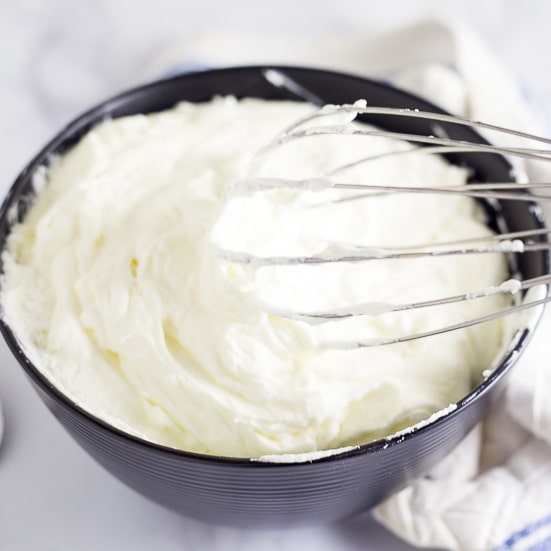 Homemade Whipped Cream is a breeze to make. All you need is 2 ingredients, a bowl, a whisk & 15 minutes. There’s absolutely nothing to it! Easy Homemade Whipped cream is so creamy and rich and delicious! When it's this easy, why get the can?