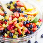 This Best Fruit Salad is easy to make and uses fresh, juicy berries. It's the perfect use for all the fresh summer fruit! Plus, one simple, natural ingredient that makes it amazing. Delicious side or dessert for a summer cookout, potluck, or gathering, and equally as delicious and an ice cream topping!