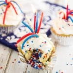 These quick and easy Firecracker Cupcakes are so fun and perfect for 4th of July and Memorial Day! These firecracker cupcakes are super festive for celebrating all summer long with a surprise of sprinkles in the middle! Make this 4th of July dessert today!