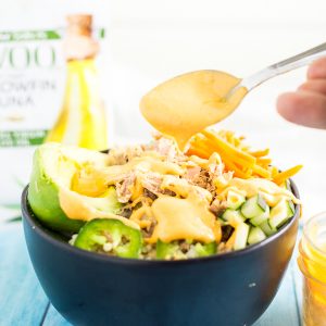 Spicy Tuna Roll Bowl Recipe - This Spicy Tuna Roll Bowl is based off a sushi favorite: spicy tuna rolls! It is so easy to make and so yummy! It includes all of the fixings of a spicy tuna roll, including tuna, cucumber, avocado, rice, and a spicy mayo dressing, all in the ease of one bowl!