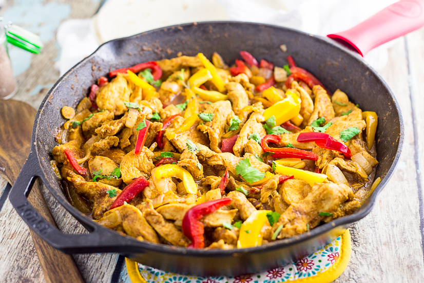 These Easy Chicken Fajitas are the perfect way to get a delicious and healthy dinner on the table in 30 minutes! A very simple marinade adds amazing flavor! These are the BEST chicken fajitas, and the marinade is seriously the best I've ever tried. Better than any restaurant!