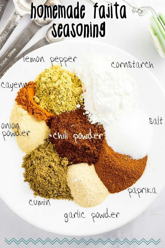 Spices to make homemade fajita seasoning on a white plate