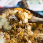 Zesty spinach chicken sausage and fresh veggies in a vibrant tomato sauce and covered in cheese in this Cheesy Chicken Sausage and Spinach Skillet Dinner recipe for an easy family dinner made in just one skillet in 30 minutes. This quick and easy sausage, veggie and rice skillet is downright delicious!