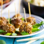Slow Cooker Mongolian Meatballs are a super easy appetizer recipe featuring savory slow cooker meatballs in a sticky Mongolian glaze sauce.  This restaurant inspired recipe is a family favorite perfect for game day food, holiday appetizers for a crowd, or even served with rice for dinner.