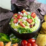 Healthy Avocado Cilantro White Bean Dip is a speedy snack that's full of flavor. This quick, easy, and healthy bean dip recipe is made with white beans, avocado, and cilantro and is so creamy! Quick and easy, and even perfect for last-minute party apps.