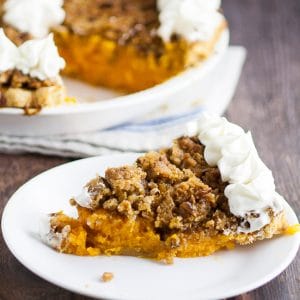 Sweet Potato Pie with Crumble Topping Recipe - Classic sweet potato pie recipe topped with a brown sugar and pecan crumble topping, just like your favorite sweet potato casserole, for a Thanksgiving pie recipe that is sure to please! #pie #recipe #pierecipe #sweetpotato #Thanksgiving