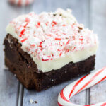 White Chocolate Peppermint Brownies Recipe - Fudgy, rich, and decadent White Chocolate Peppermint Brownies make a festive and delicious holiday treat with a fudgy brownie, white chocolate, and crushed candy canes. A perfect festive and easy Christmas dessert and treat!