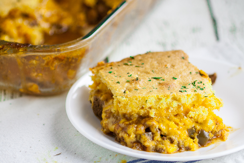 Cornbread Taco Casserole Recipe - Quick and easy Cornbread Taco Casserole is perfect for the busy family. Cheesy taco topped with warm cornbread that can all be prepped in just 15 minutes! Quick and easy casserole recipe that's perfect for potlucks or an easy dinner recipe! So cheesy!