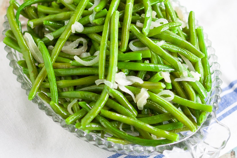 Green Beans with Shallots Recipe - A quick and easy recipe for Green Beans with Shallots.  So simple and easy but so flavorful and delicious! This easy green bean recipe is delicious enough for holidays and easy enough for weeknights! 