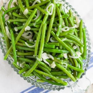 Green Beans with Shallots Recipe - A quick and easy recipe for Green Beans with Shallots.  So simple and easy but so flavorful and delicious! This easy green bean recipe is delicious enough for holidays and easy enough for weeknights! 