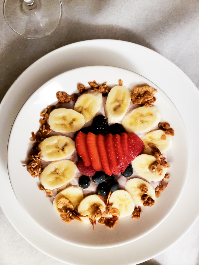 Rainbow acai bowl from Omni Hotels & Resorts in a white bowl