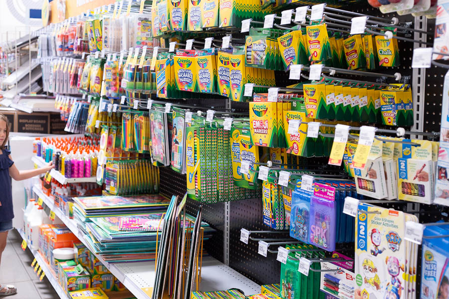 Rows of coloring supplies on store shelves