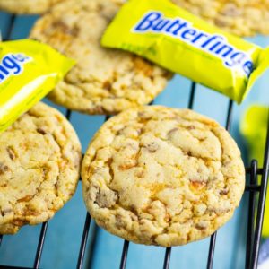 Chewy Butterfinger Cookies with crispy edges are packed with sticky, sweet Butterfinger pieces and chocolate and peanut butter flavor.