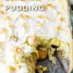 Overhead picture of southern banana pudding topped with meringue next to a banana on a rustic wood background with the words 