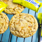Close up of a Butterfinger cookie surrounded by more cookies and fun size Butterfinger candy bars
